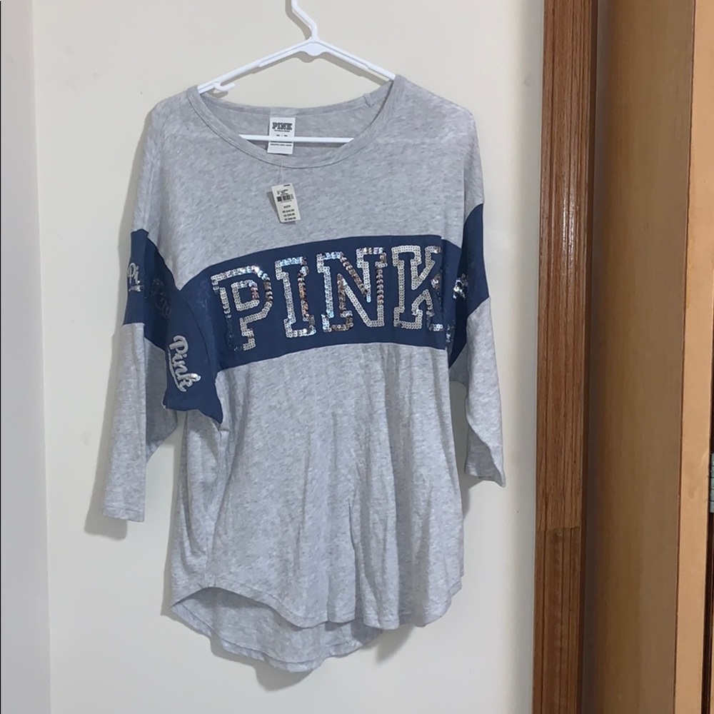 PINK crewneck sweater with blue banner and sequins